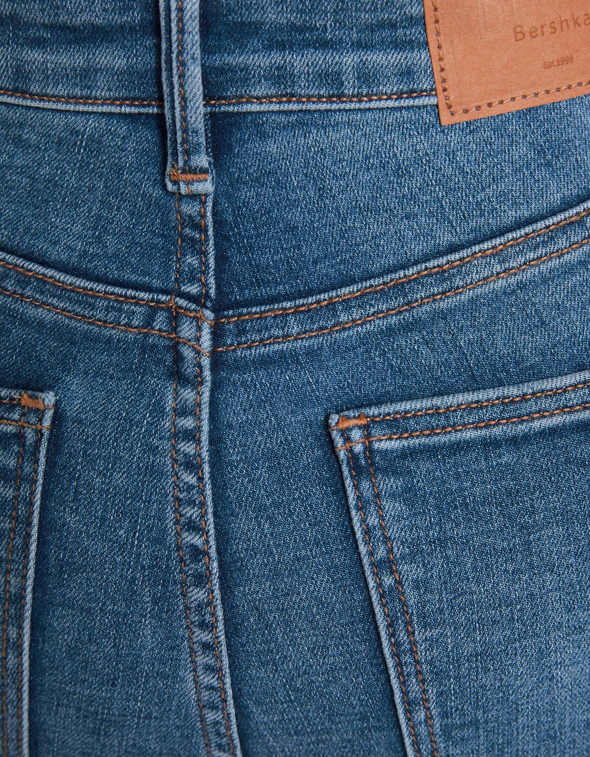 calça jeans skinny de cintura super alta