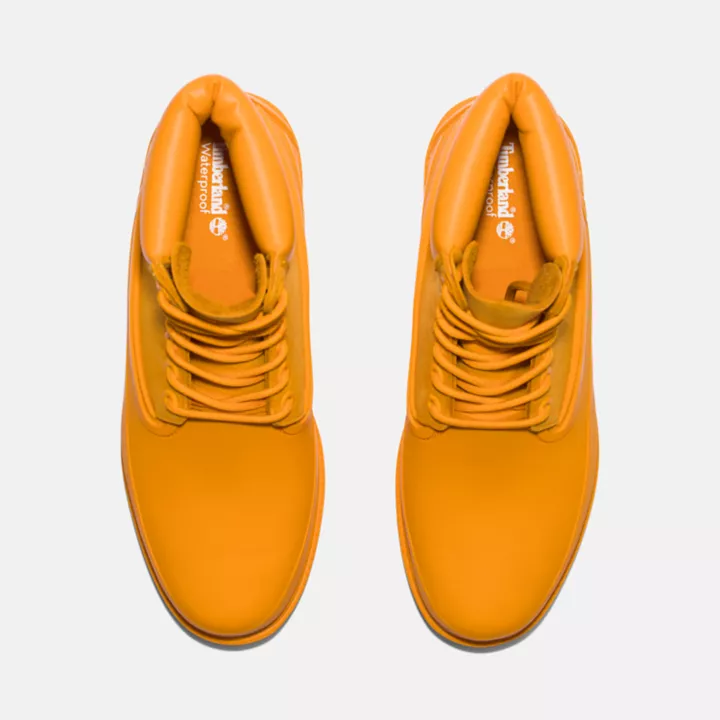 Bota Timberland Heritage de 6 polegadas com biqueira de borracha para homem, na cor laranja.
