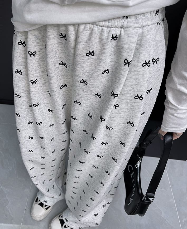 evanesce - Joggingbroek met hoge taille en wijde pijpen en strikprint