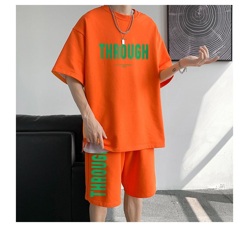 POSI - Set: T-shirt met korte mouwen en belettering + korte broek