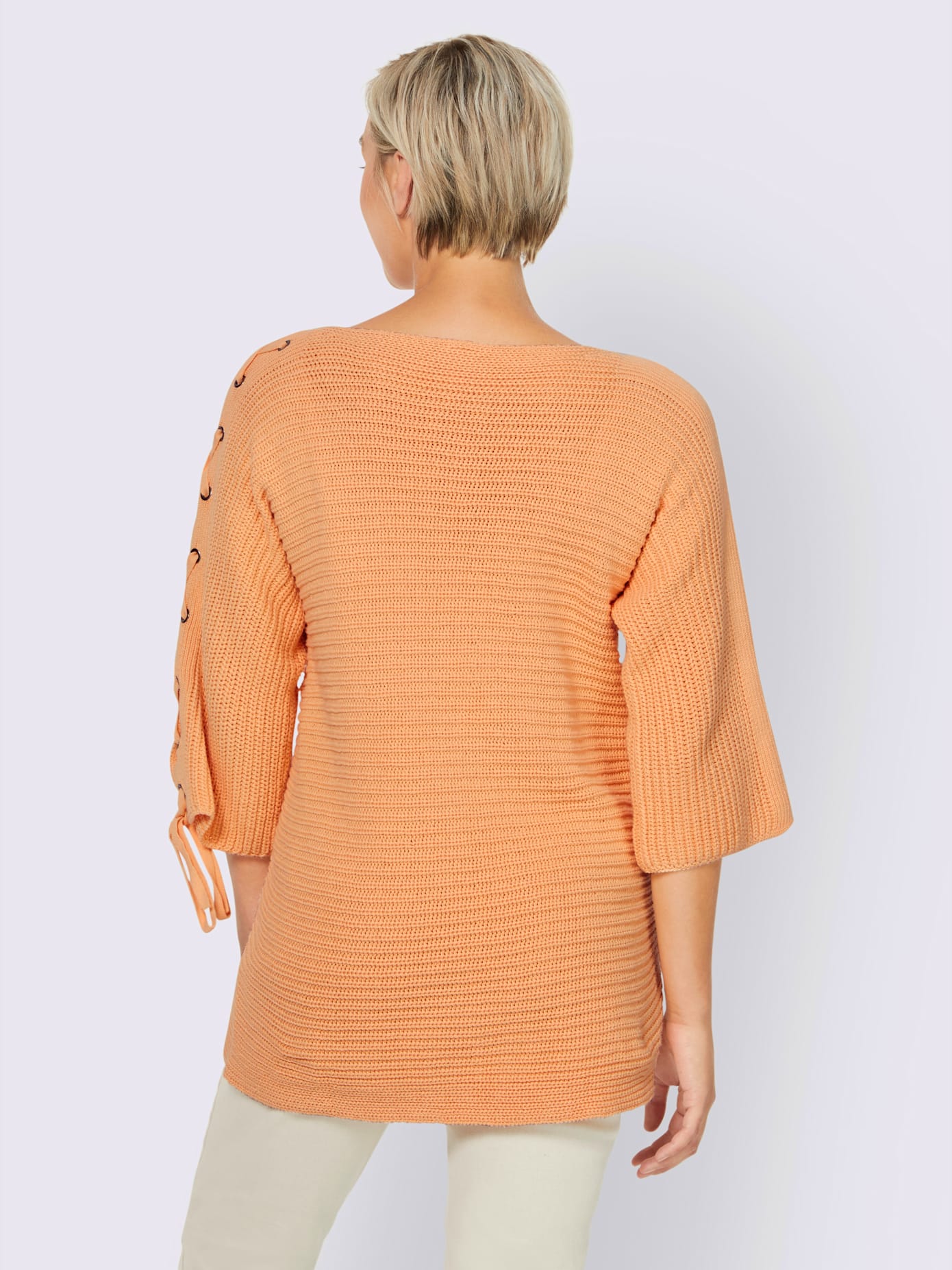 Pull laçage mode aux manches