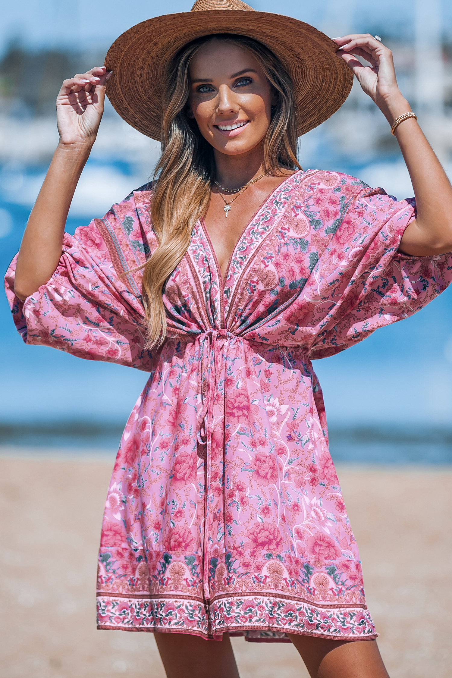 Robe mini avec manches blouson et col plongeant à fleurs roses