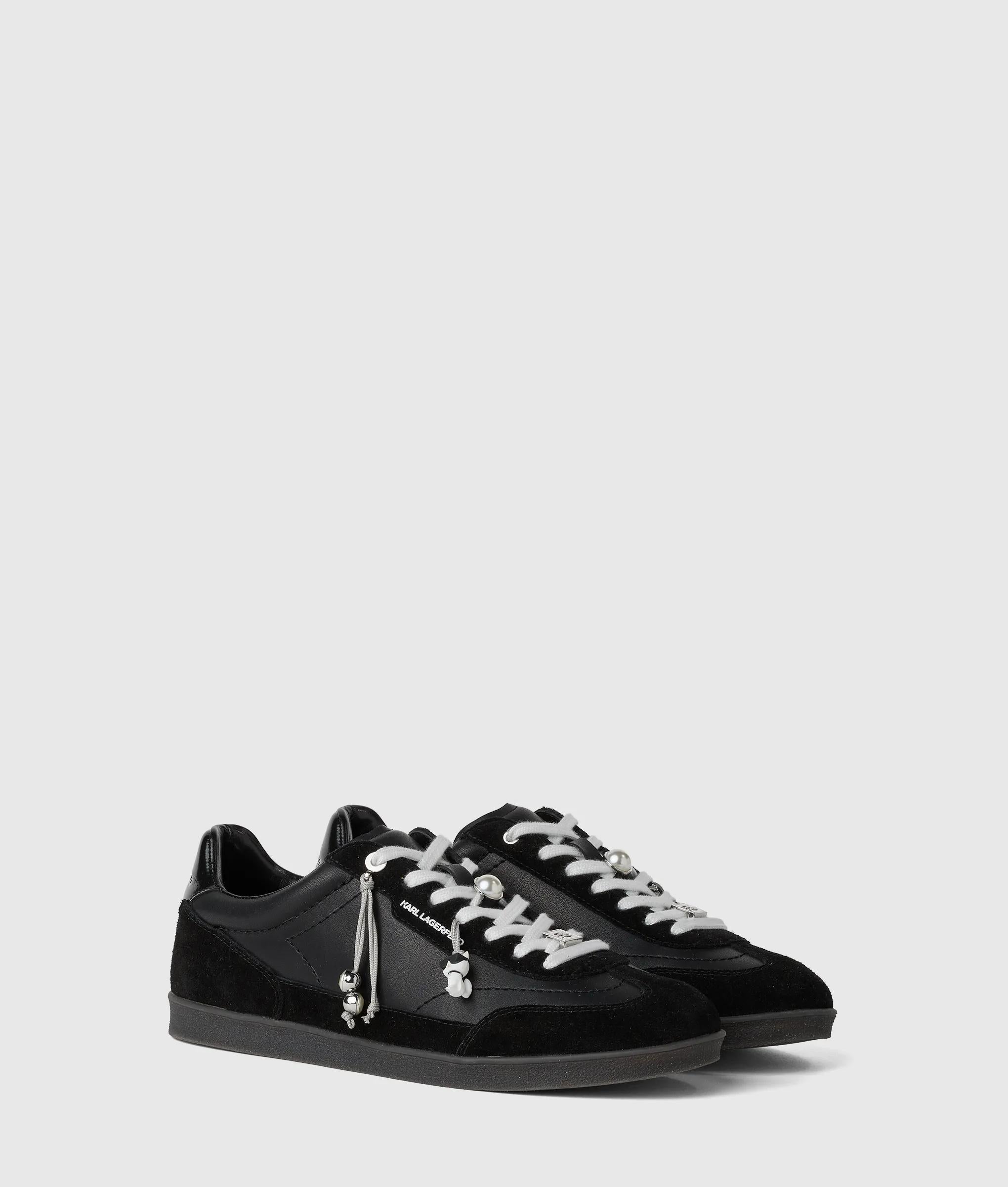 Kandidate sneakers met Ikon-bedels