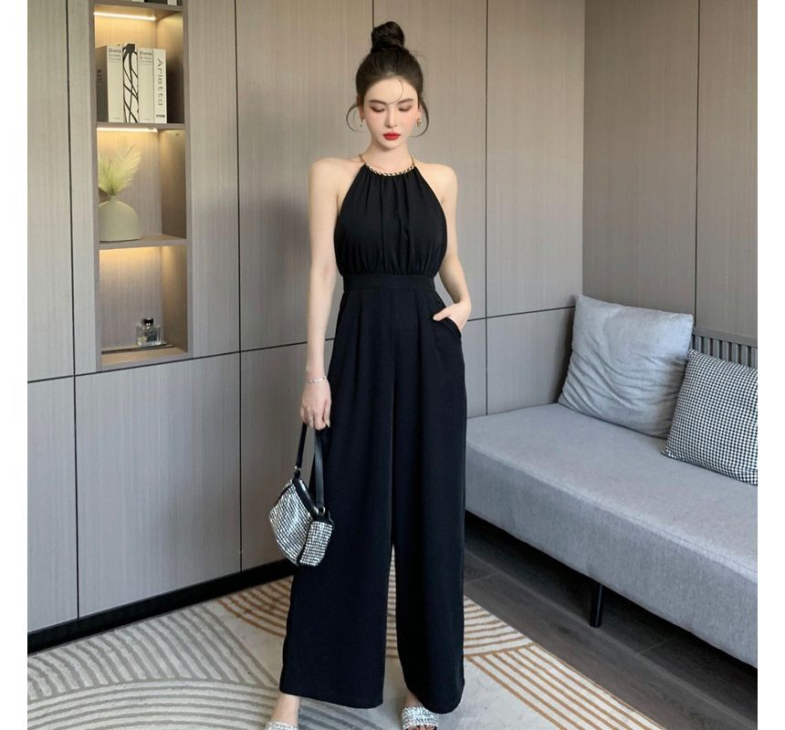 Yilda - Jumpsuit met spaghettibandjes en halterhals en wijde pijpen