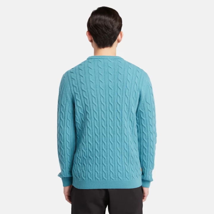 Suéter masculino Phillips Brook com gola redonda em tricô trançado na cor azul.