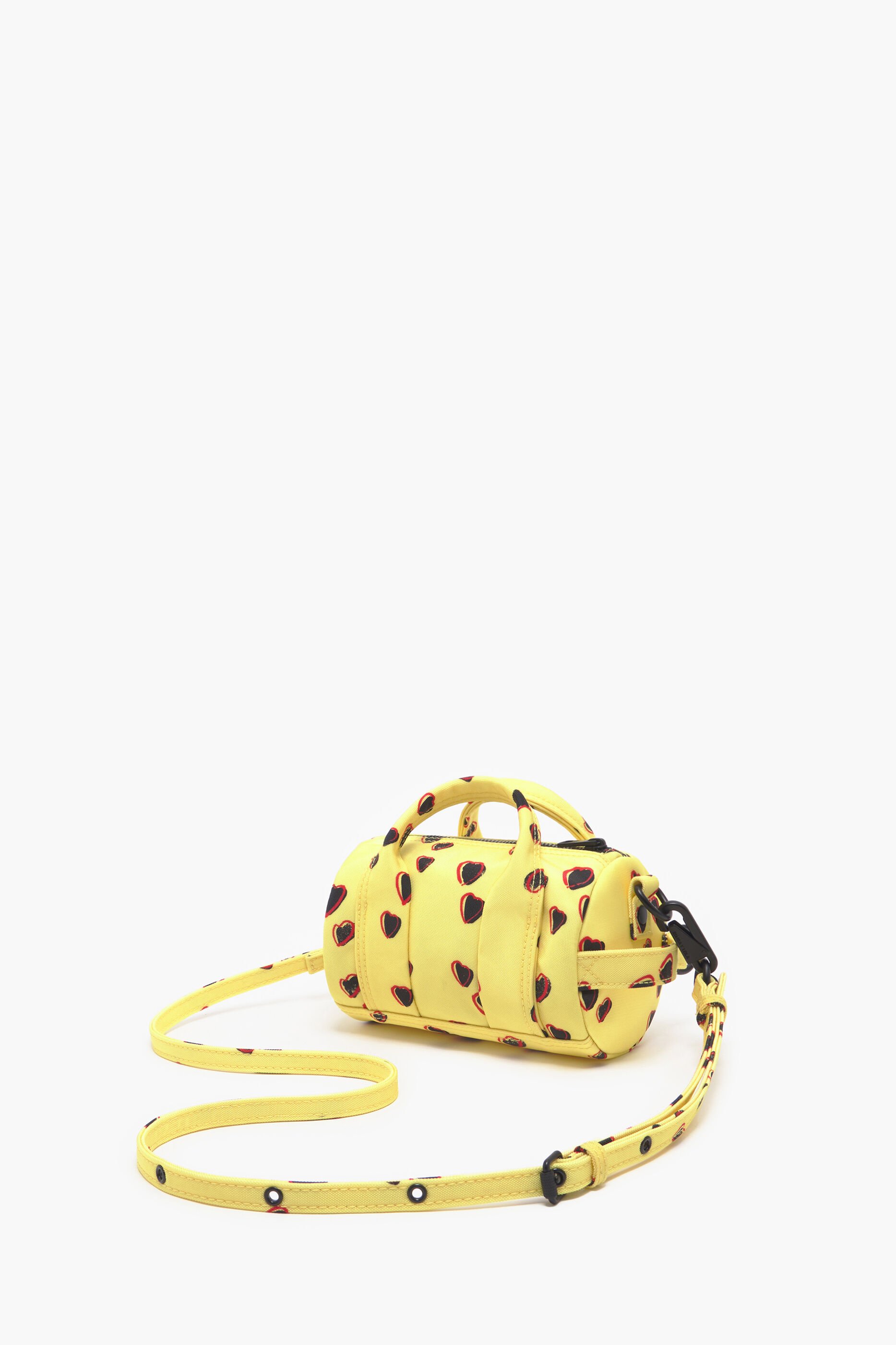 Bolsa cilíndrica de nylon tamanho XS com estampa de pequenos corações, amarela.