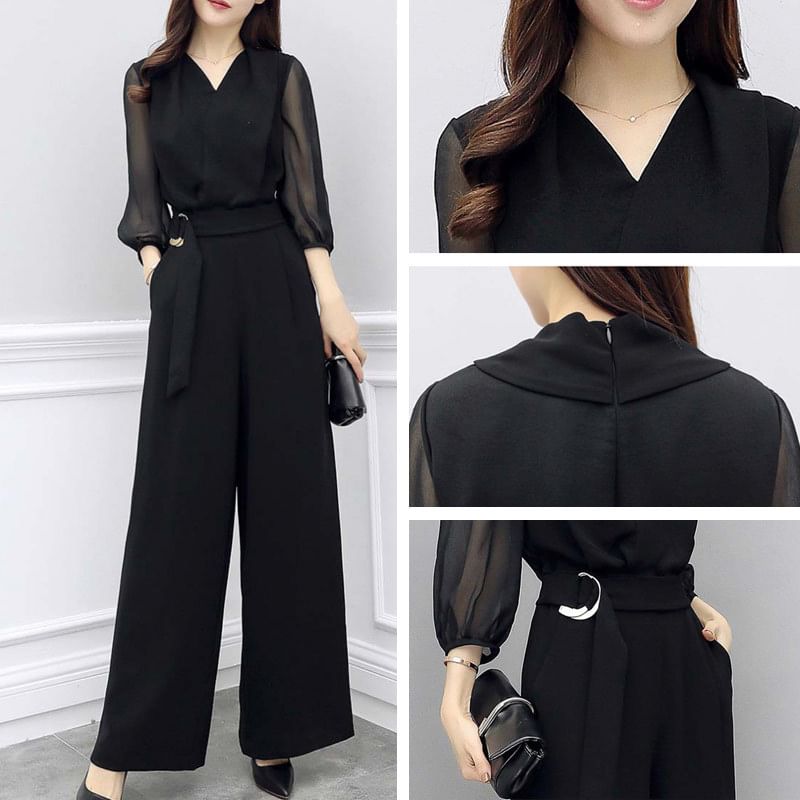 Kwuartz - Jumpsuit met pofmouwen, V-hals, effen strikceintuur en wijde pijpen