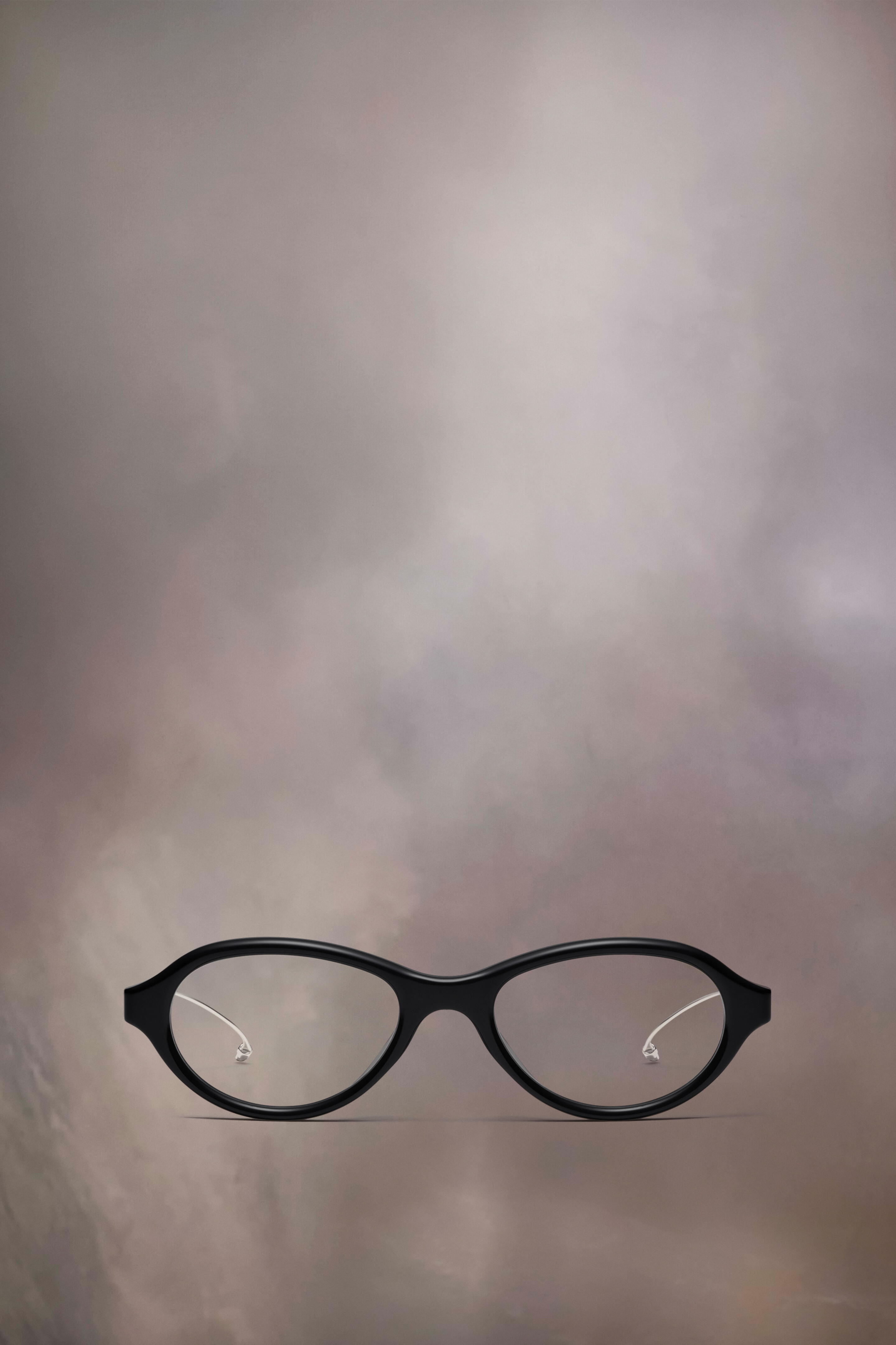 Lunettes noires x Gentle Monster​