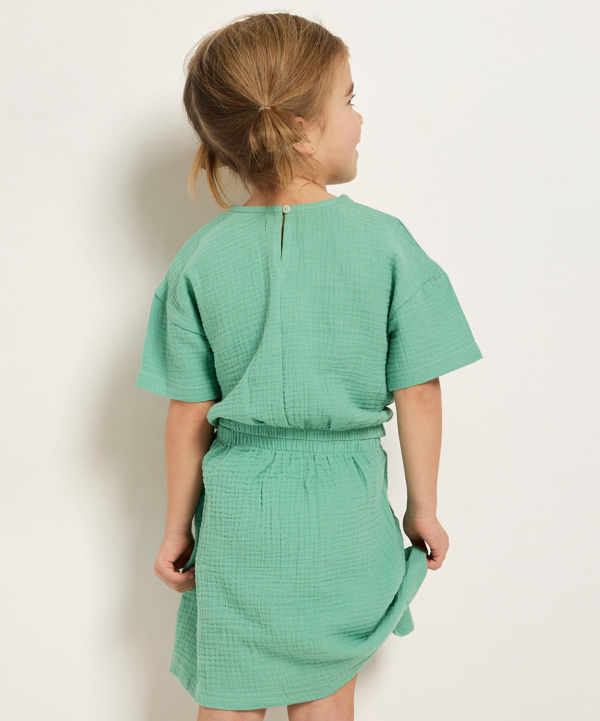 uni mousseline jurk met open zijkant