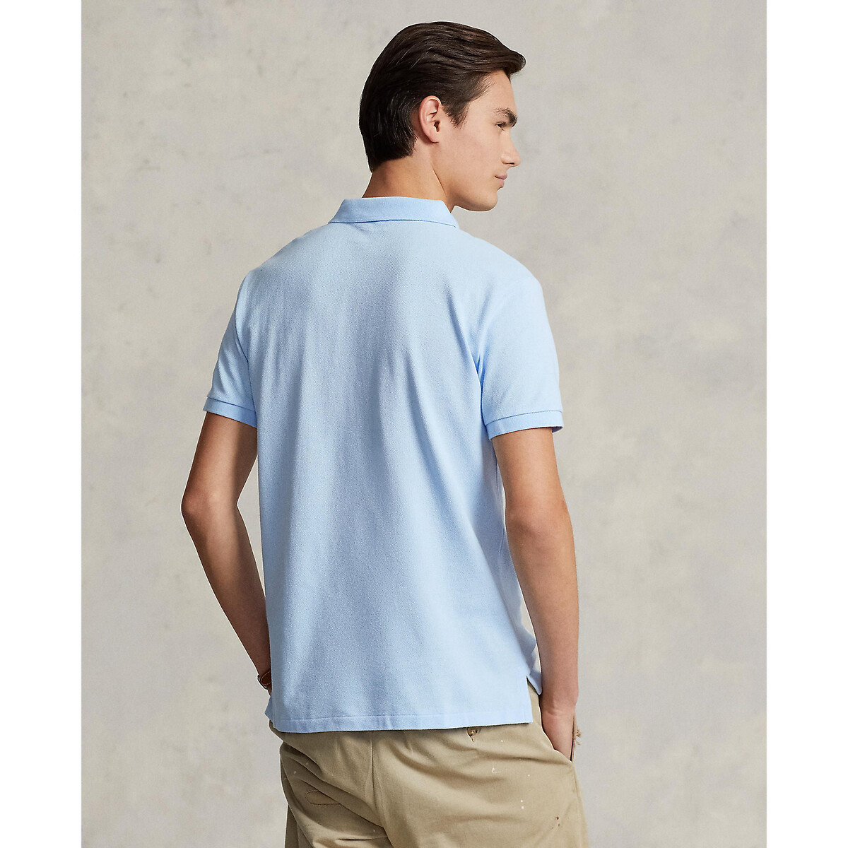 Polo Ralph Lauren<br>Polo slim fit personalizada, com bordado do jogador de pônei