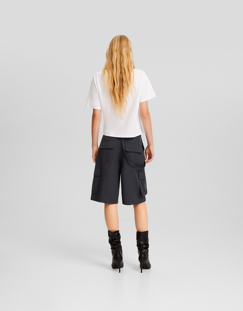 Bermudas multicoloridas com alça