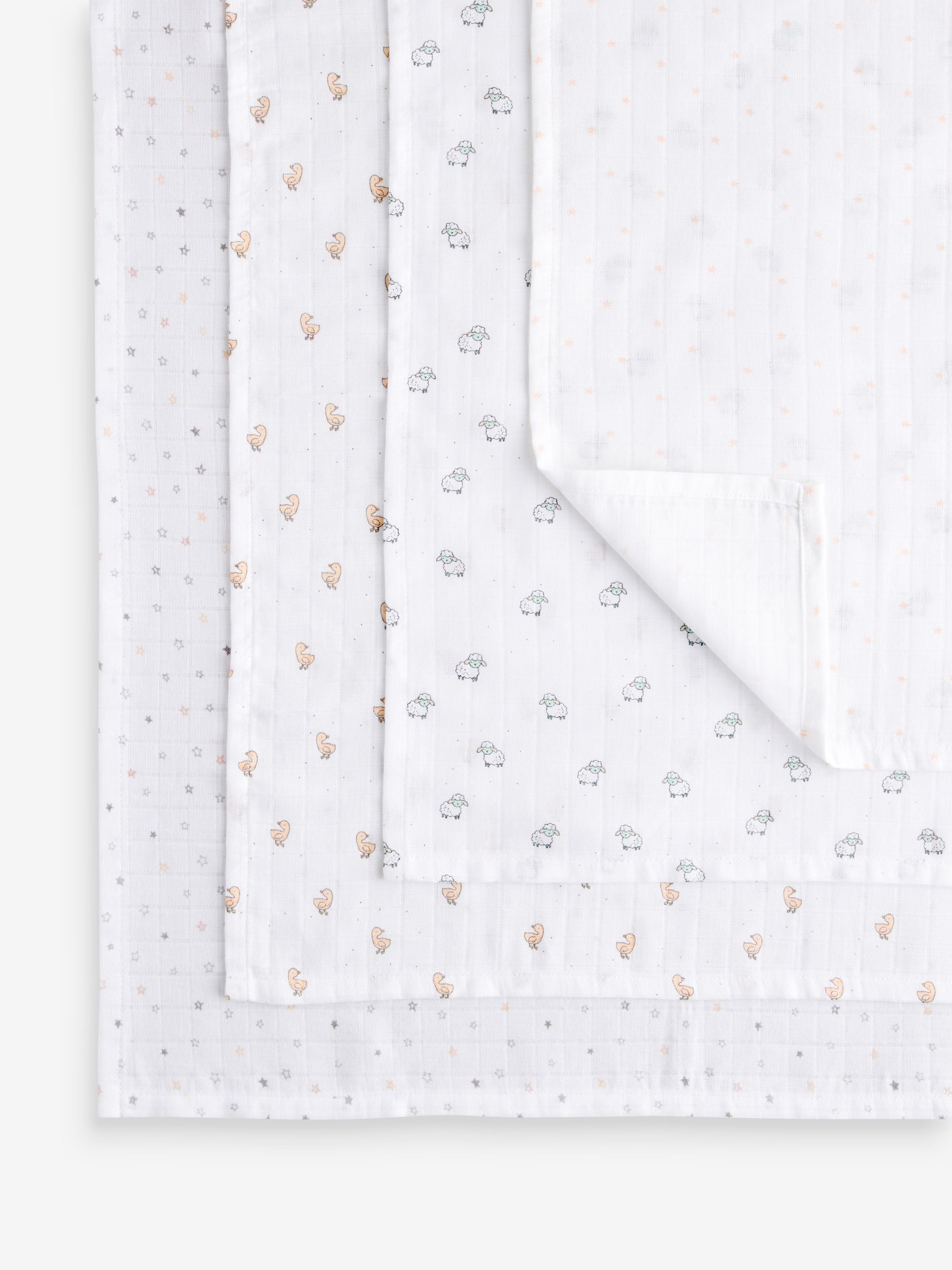 Wit met subtiele dierenprint - Set van 4 mousseline babydoekjes