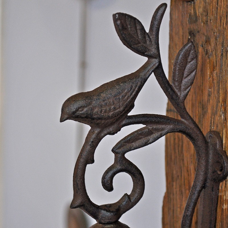 Cloche carillon fonte oiseau 12x8x24cm