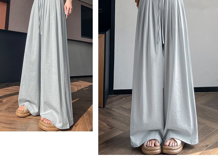 Tel tot 10 - Effen broek met wijde pijpen en trekkoord in de taille (verschillende ontwerpen)