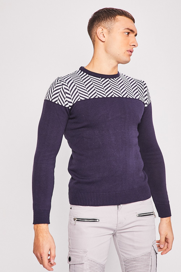 Pull bleu en maille à motifs blancs