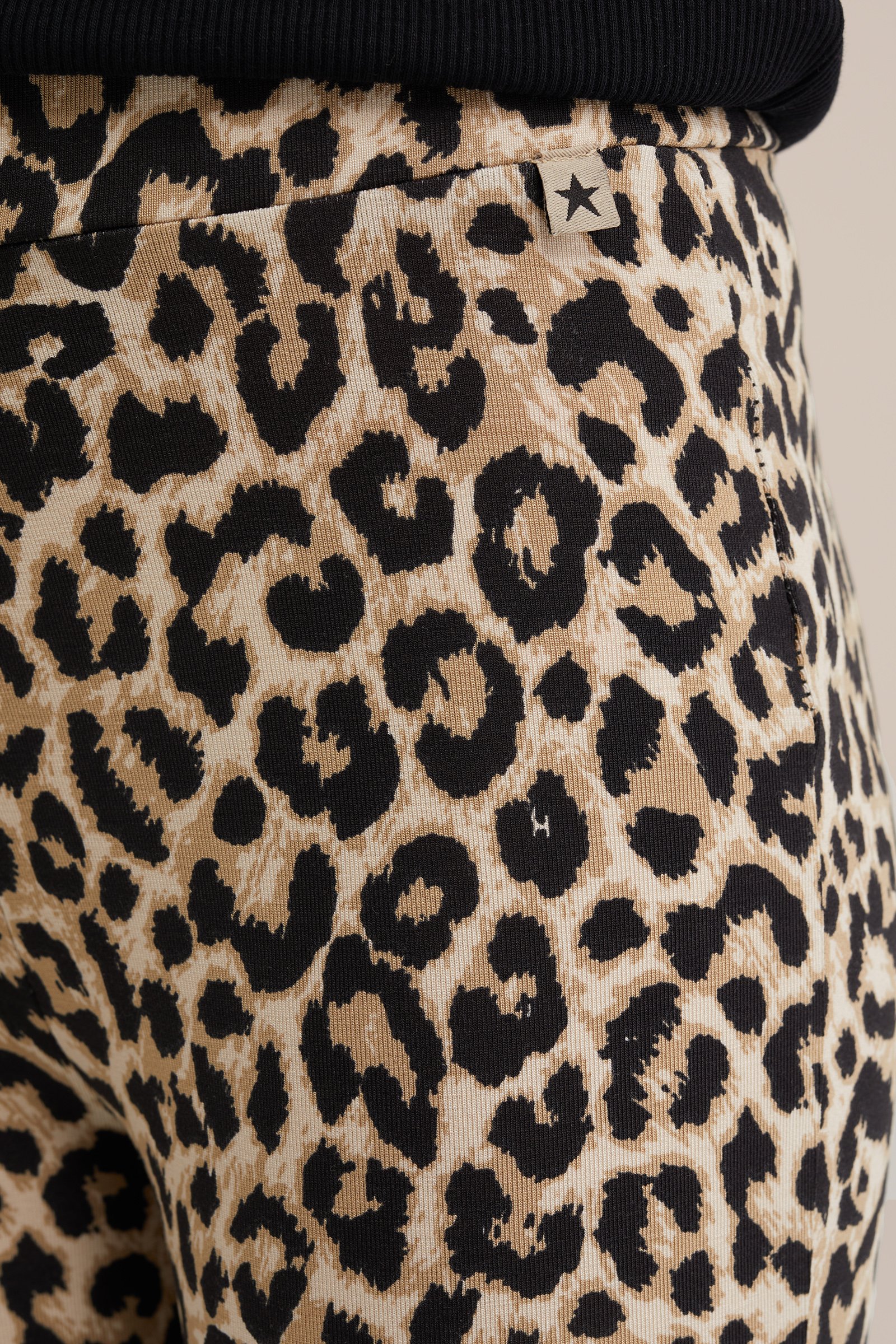 Meisjes flared legging met dessin WE Fashion Lichtbruin