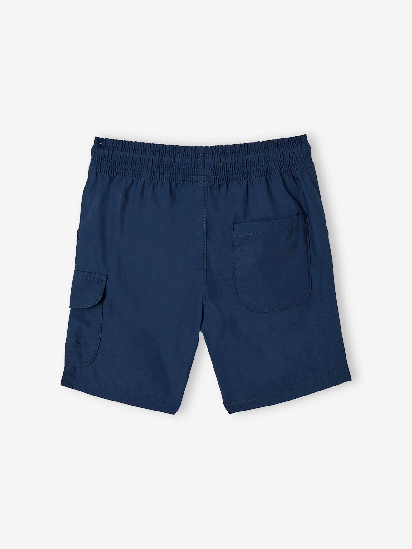Bermudas fáceis de vestir para meninos, lisas em azul escuro com estampas.