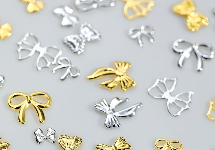 Padoma - Set van 50: Nail Art-decoratie met strik van legering (verschillende ontwerpen)