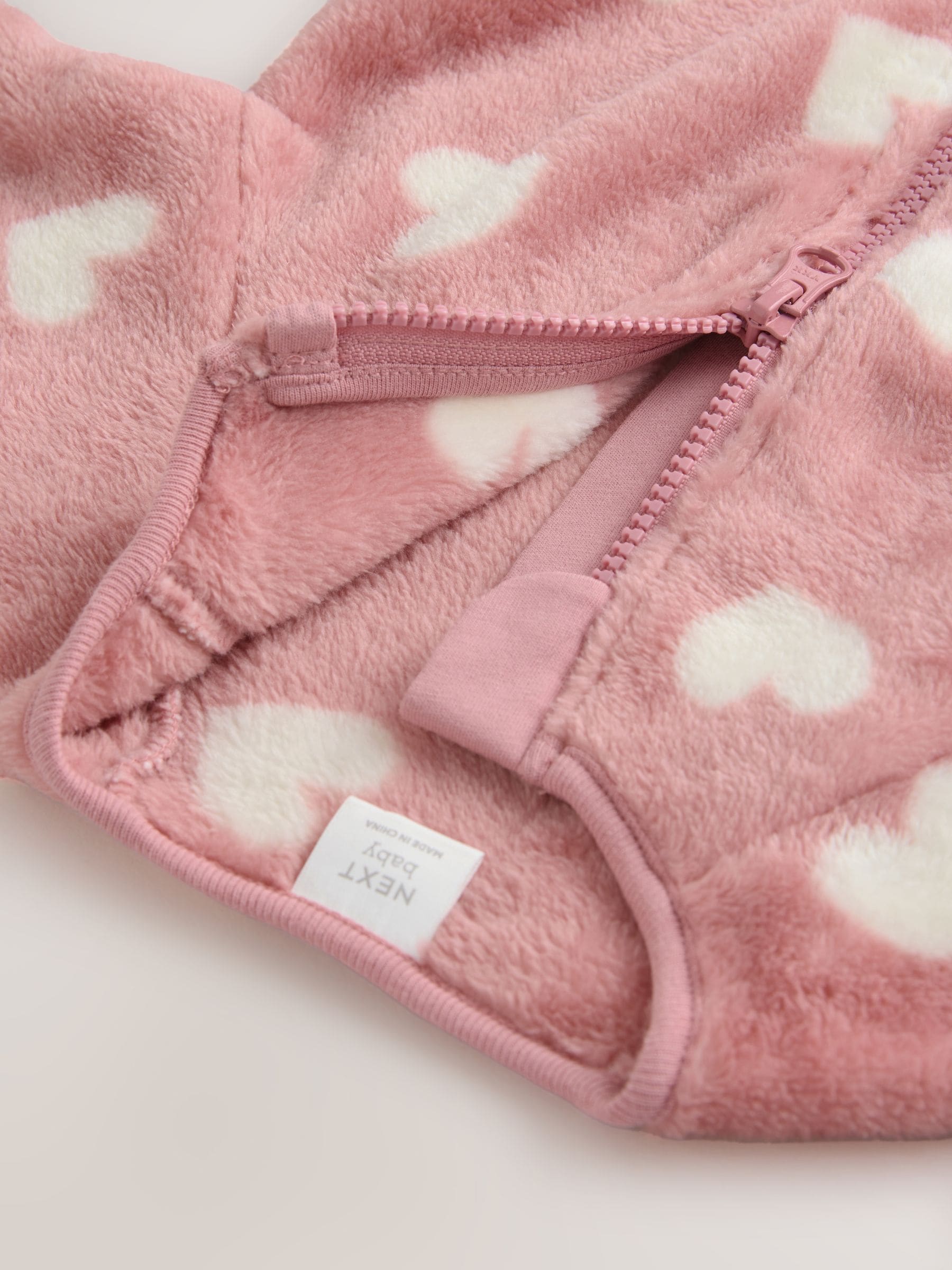 Roze hartenprint - Fleece babypyjama