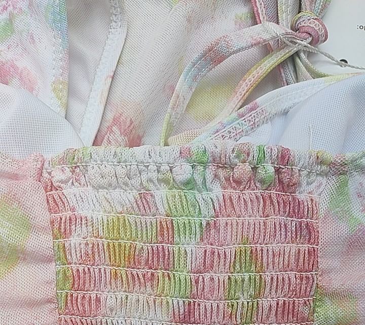 Sancus - Set: Halter bikinitop met bloemenprint + broekje + omslagrok