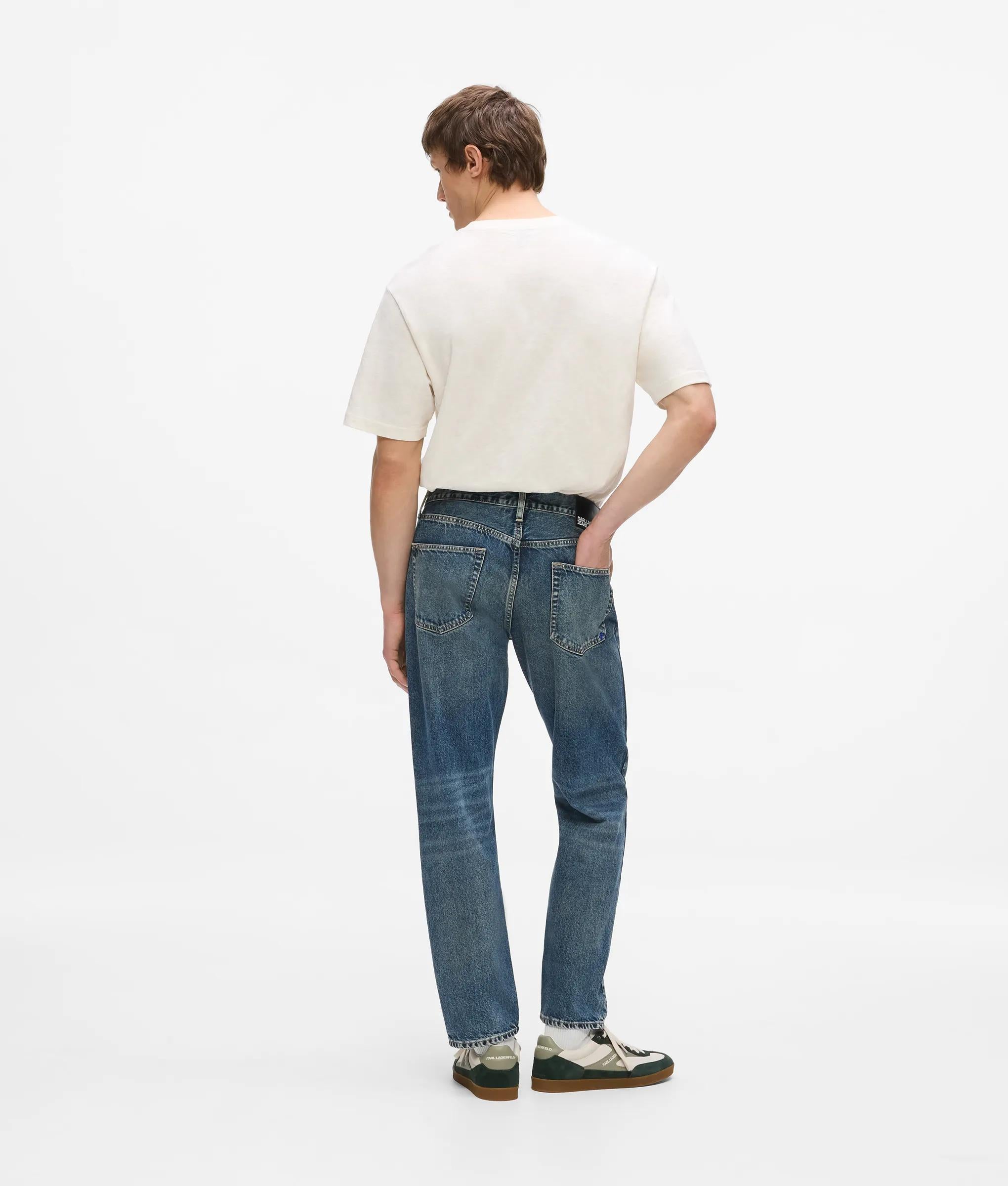Donkerblauwe smal toelopende jeans