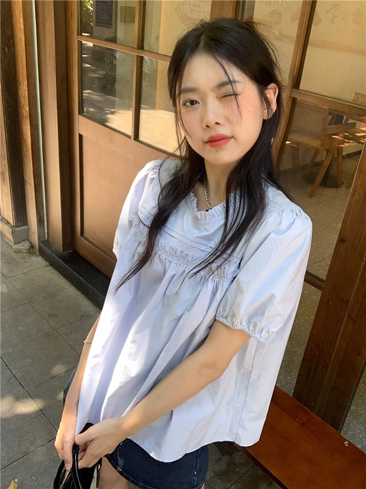 Shinsei - Blouse met pofmouwen, ronde hals en ruches