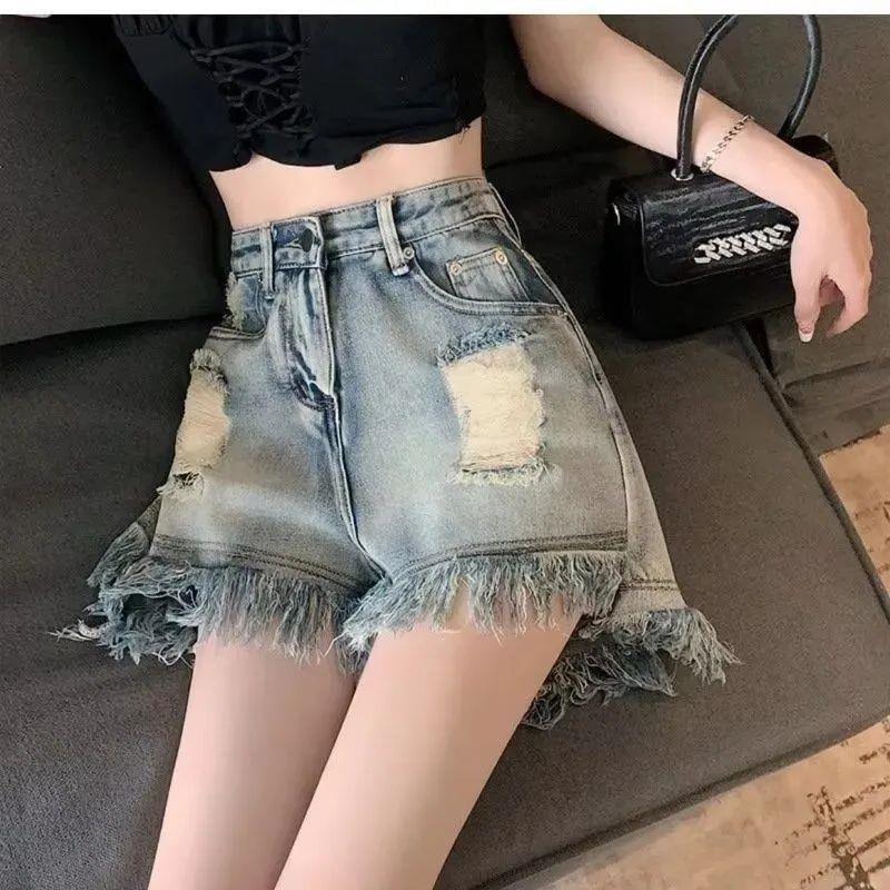 Sundine - Hoge taille gewassen distressed denim shorts