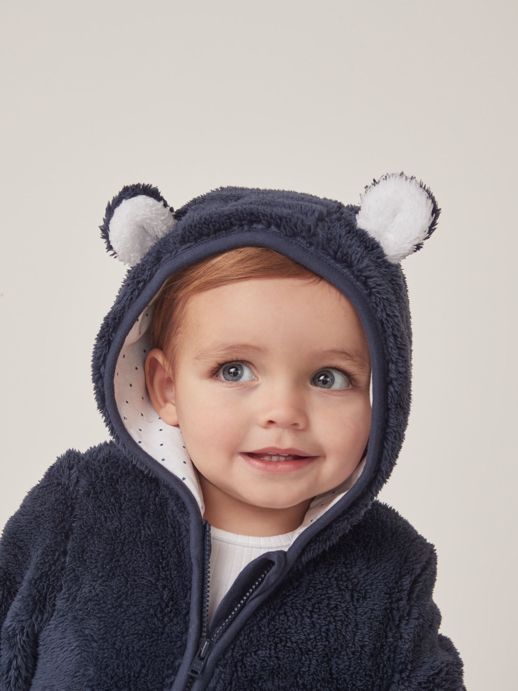 The White Company marineblauwe romper van fleece