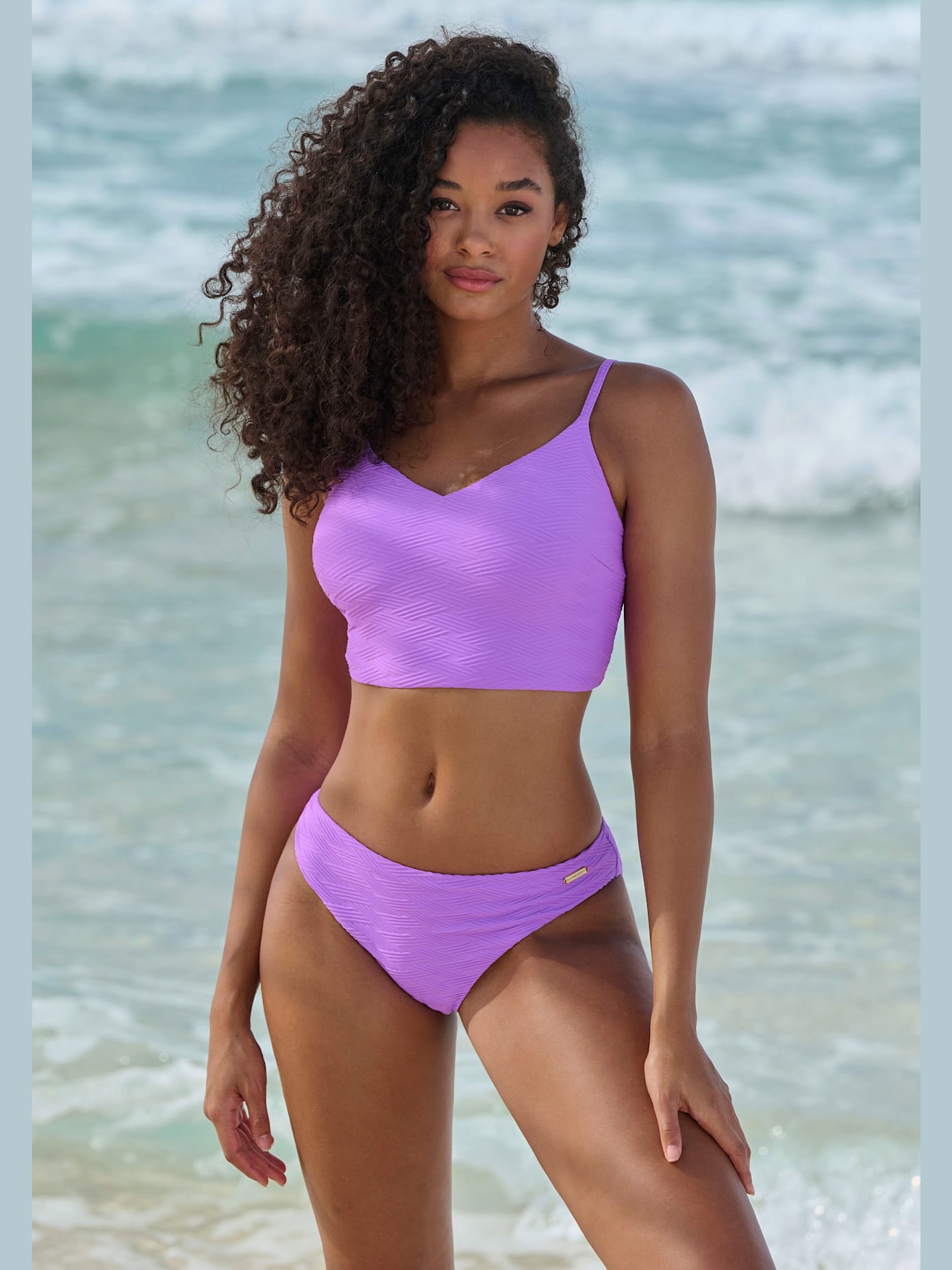 Haut de maillot de bain court matière structurée aux couleurs tendances