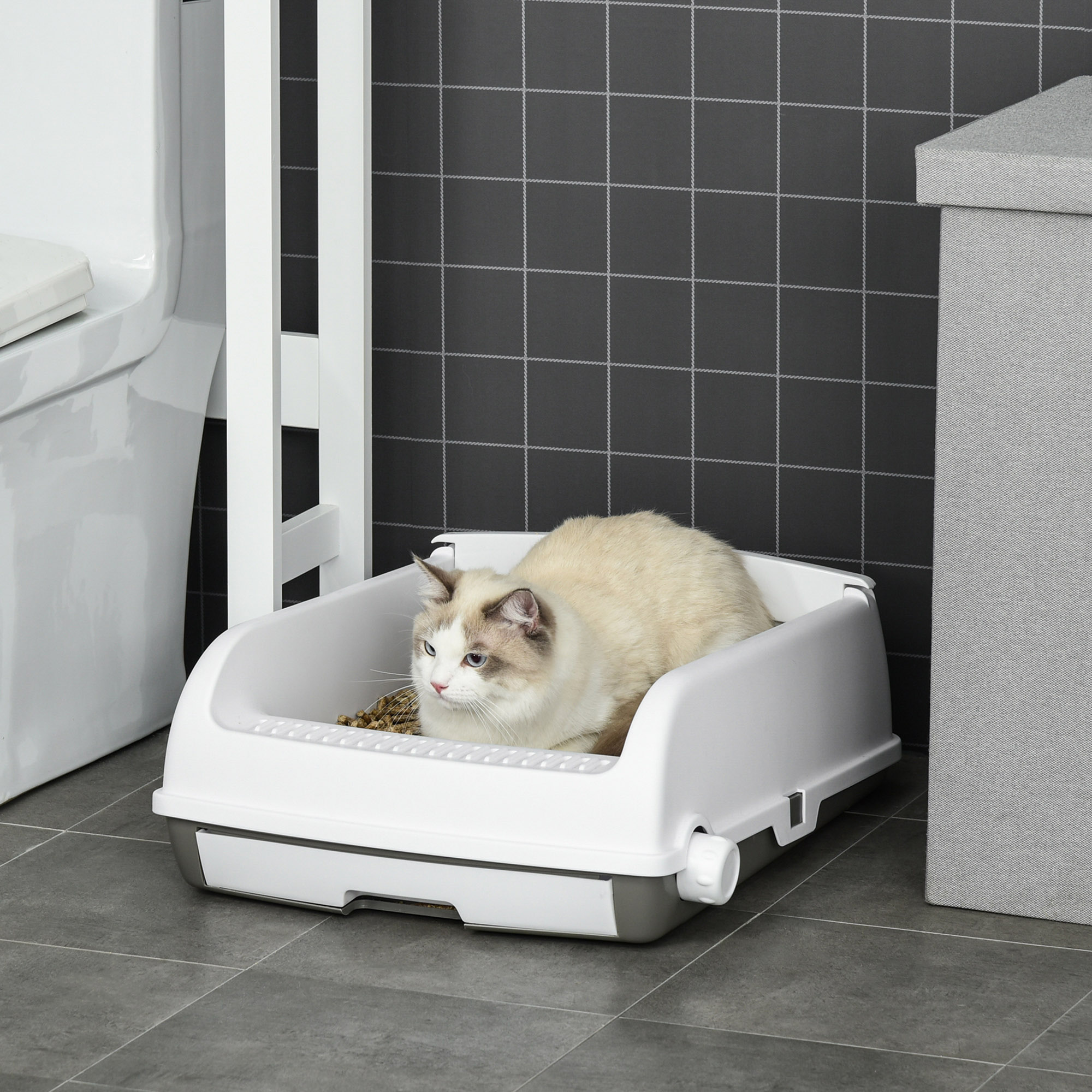 Caixa de areia semiautomática branca PawHut para animais de estimação com botão.