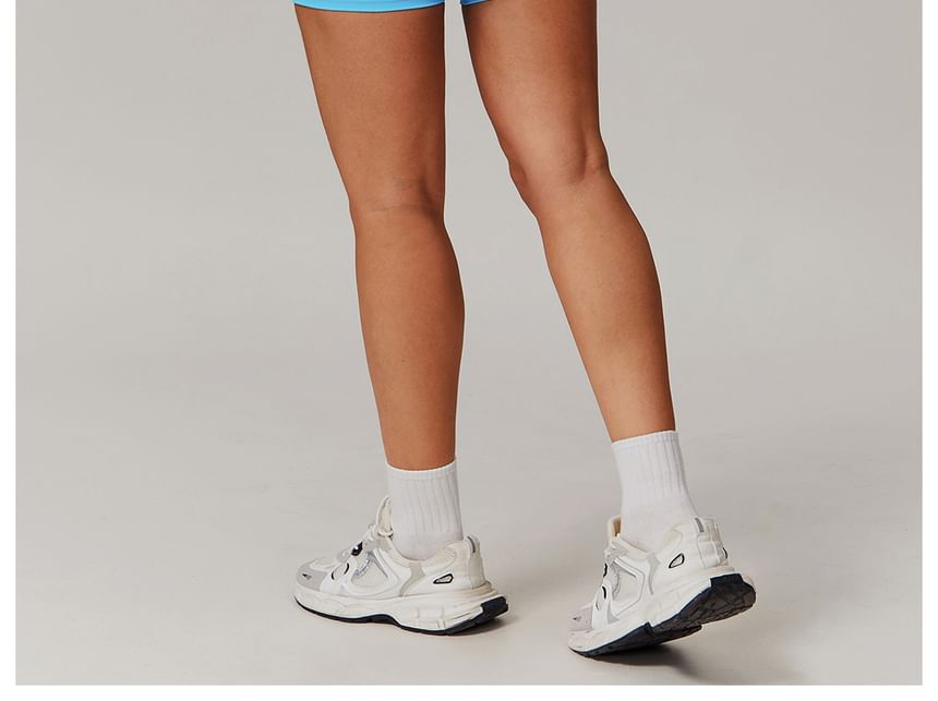 Skinniano - Sporttop met vierkante hals en effen crop top