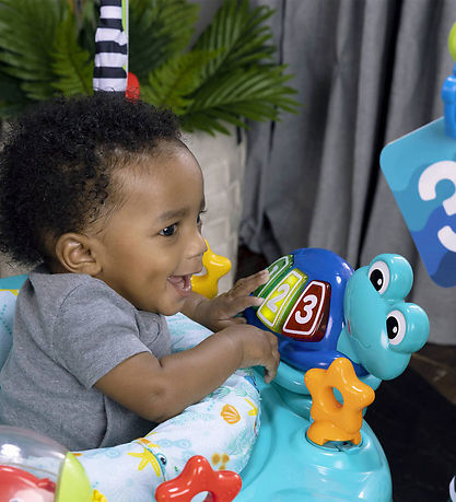 Baby Einstein Hüpfspielzeug und Aktivitätstisch - 2-in-1 - Curio