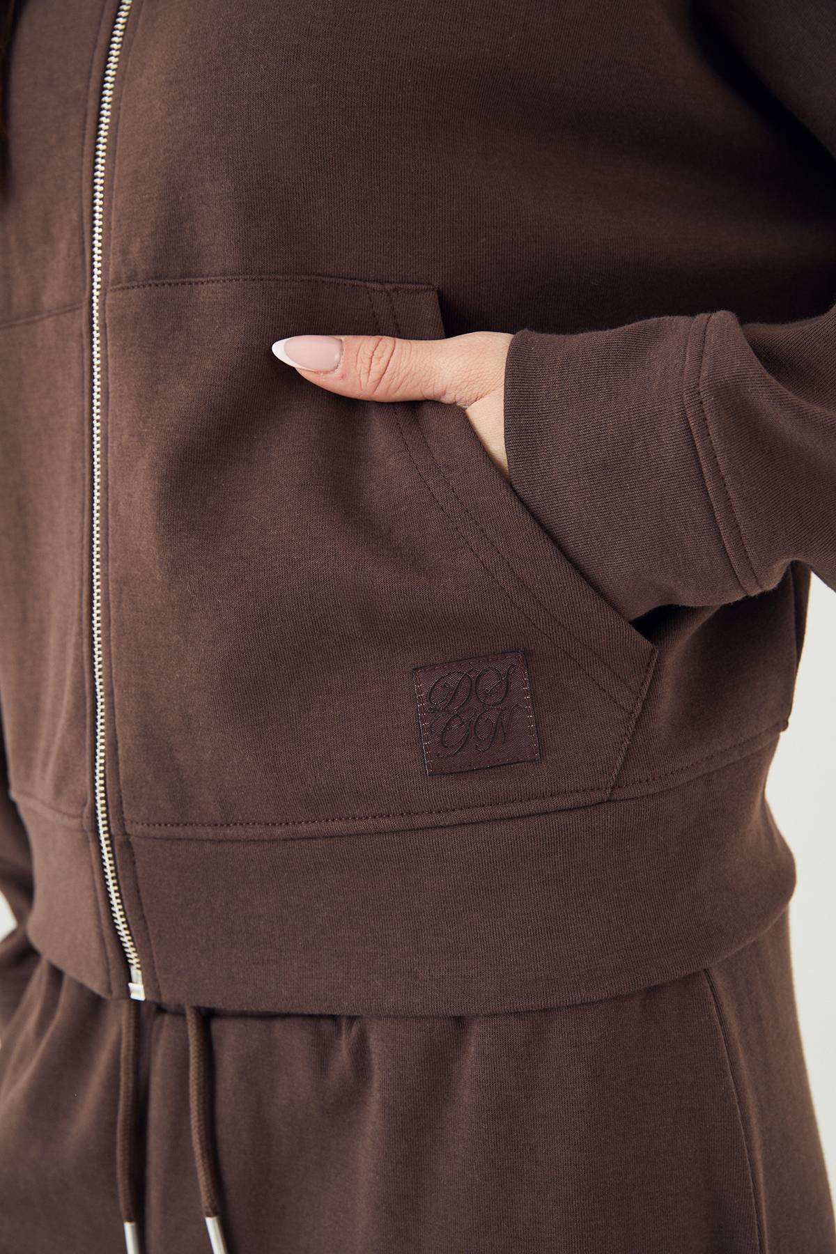Bomber DSGN Studio à Col Entonnoir Zippé en Maille Interlock