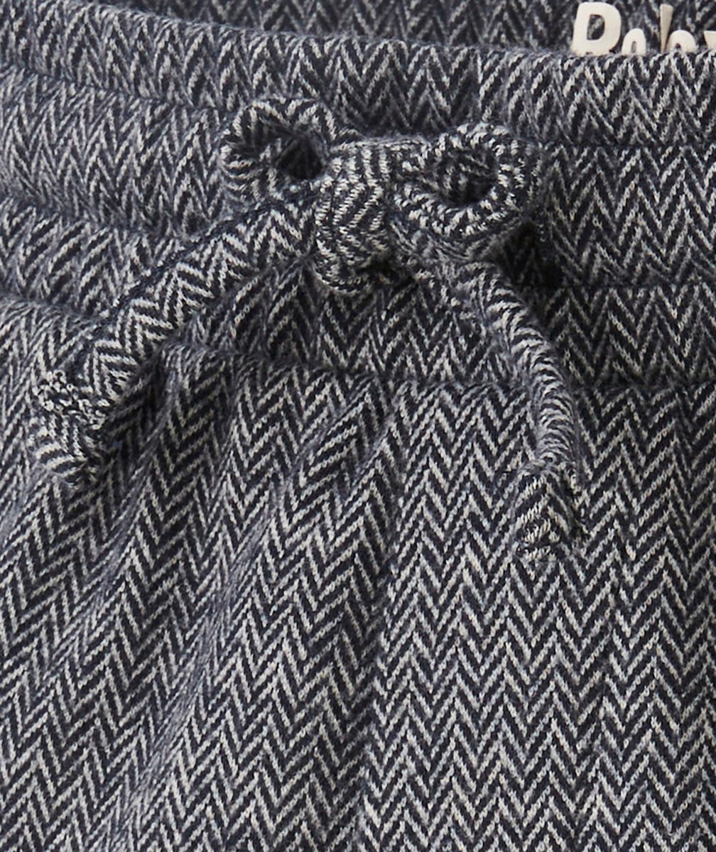 PANTALON RELAXED GARÇON EN FIBRES RECYCLÉES À CARREAUX GRIS