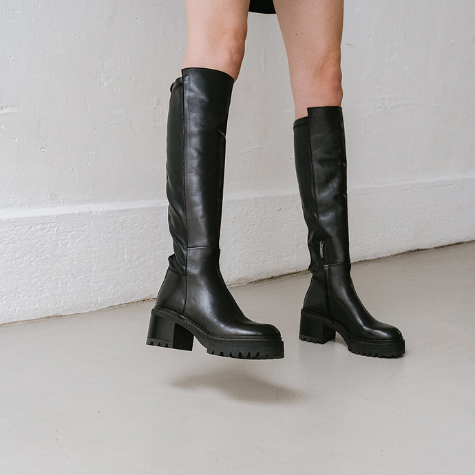 Bottes à semelles crantées  en cuir et stretch noir