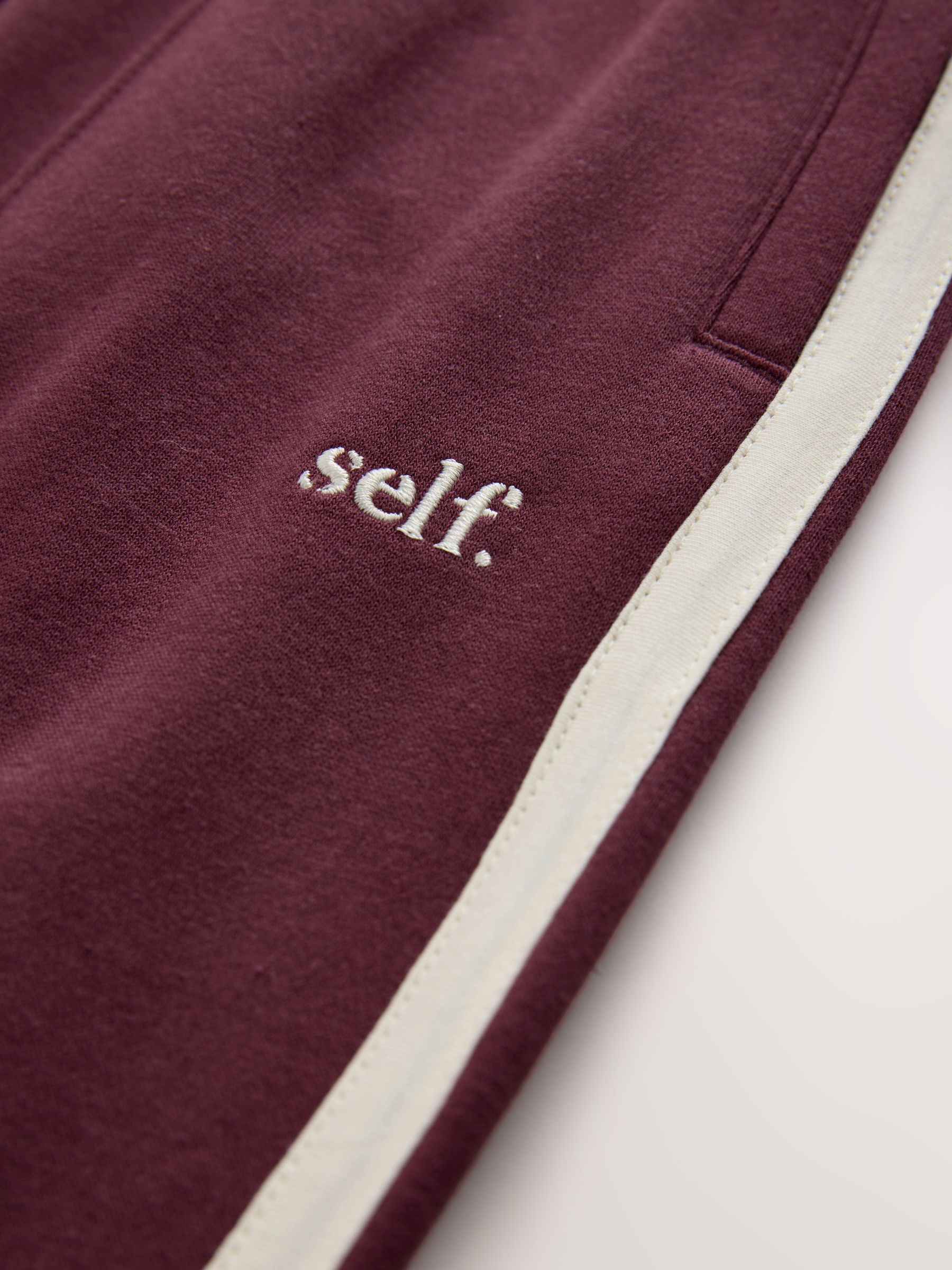 Bordeauxrood - self. Joggingbroek met wijde pijpen