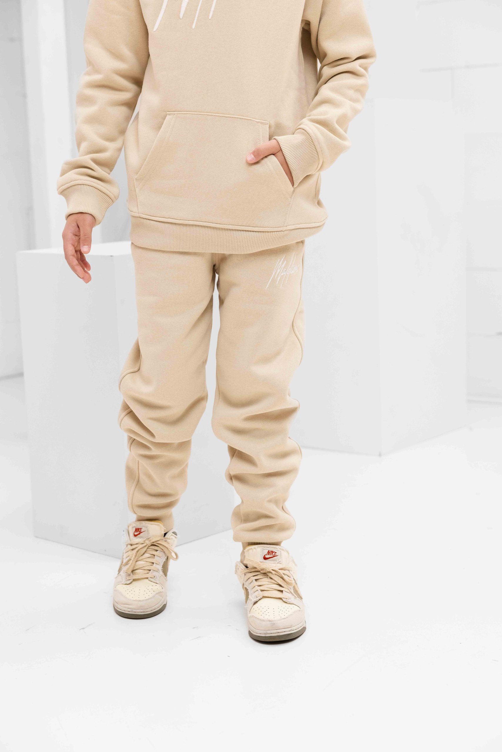 Malelions Essentials Trainingspak Kids Beige