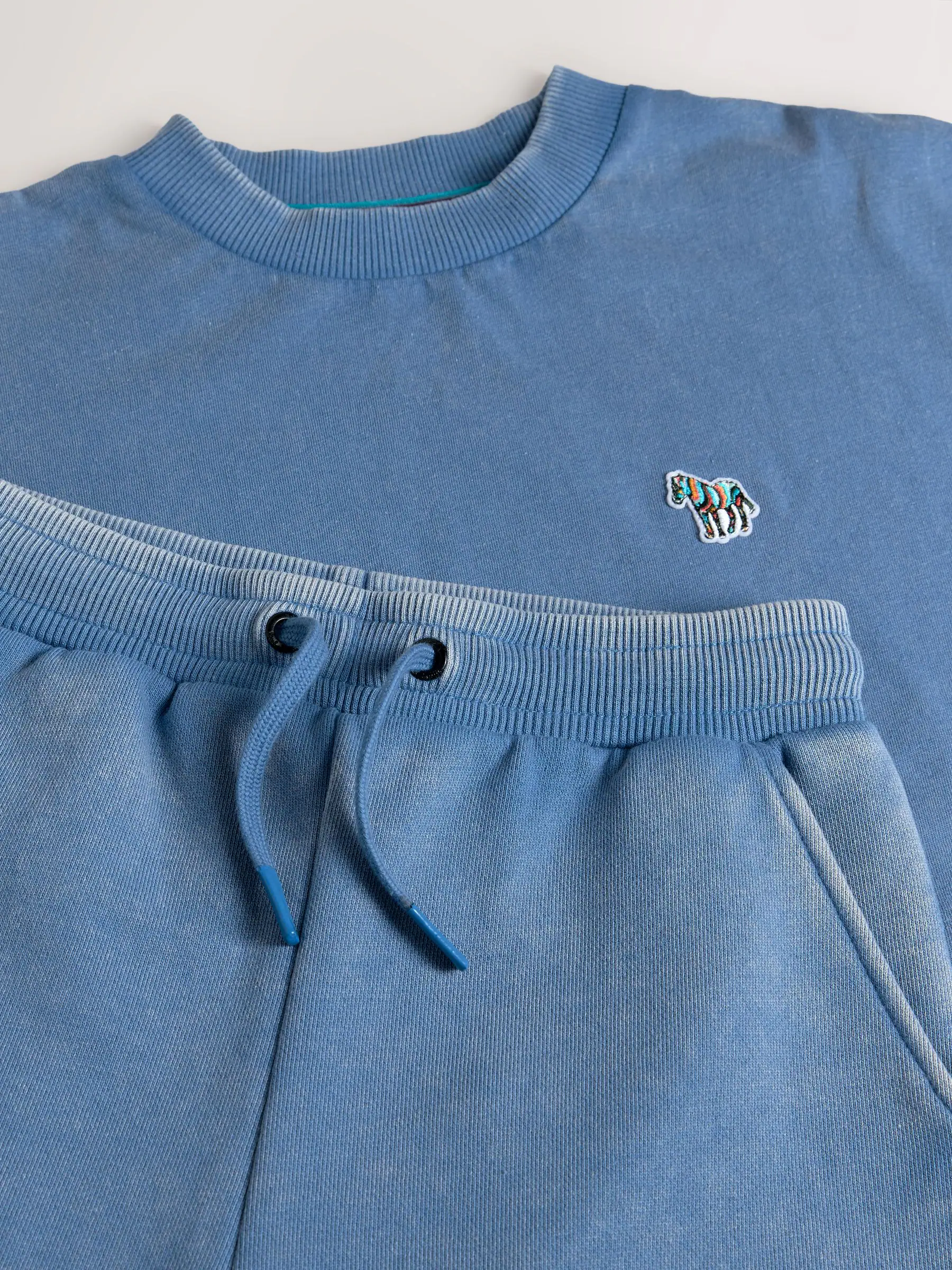 Blauwe wassing - Paul Smith Junior set van top en shorts voor jongens