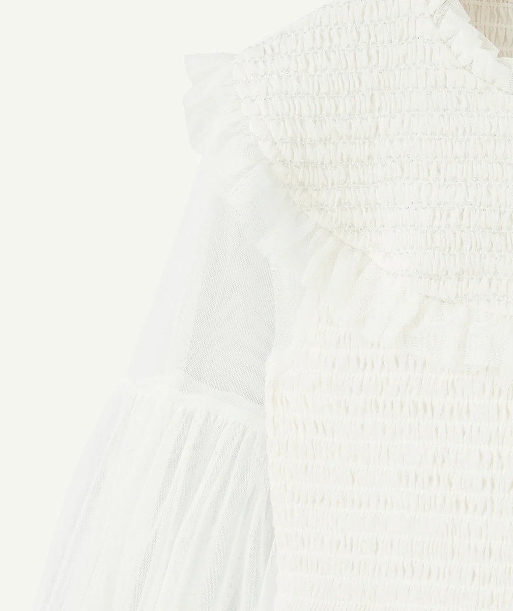 ROBE BLANCHE FILLE EN TULLE AVEC DÉTAILS COULEUR ARGENTÉE ET VOLANTS