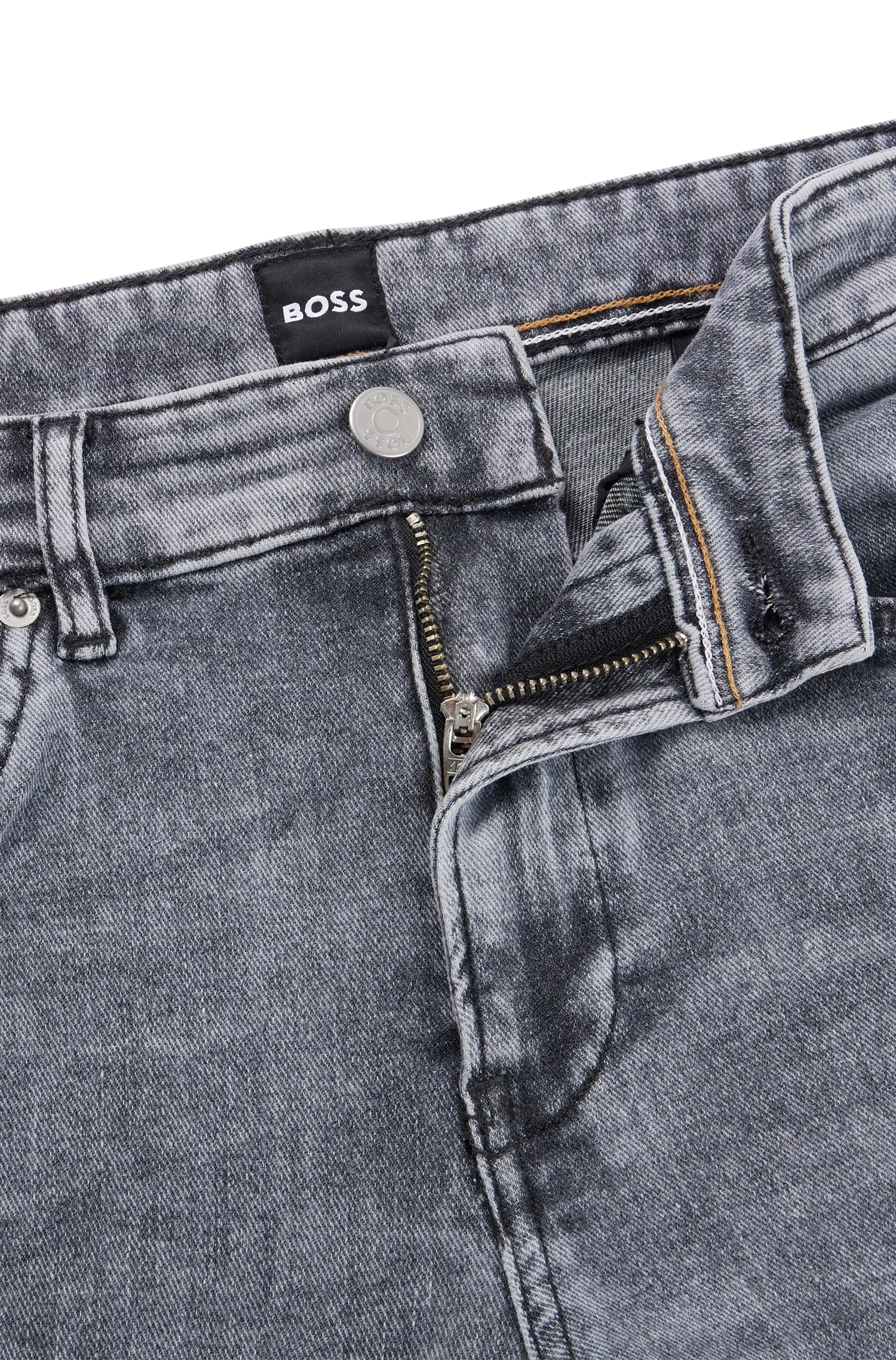 Calça jeans BOSS preta, corte slim, em denim italiano stretch cinza lavado.