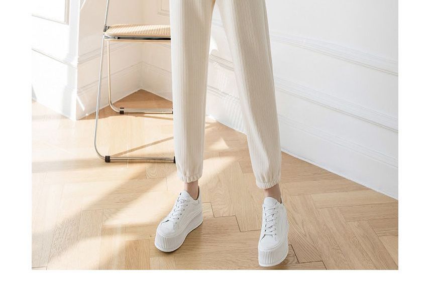 CRIBI - Hoge taille effen geribbelde fleece-gevoerde joggingbroek