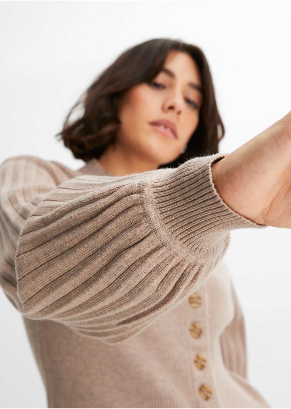Pull à patte de boutonnage