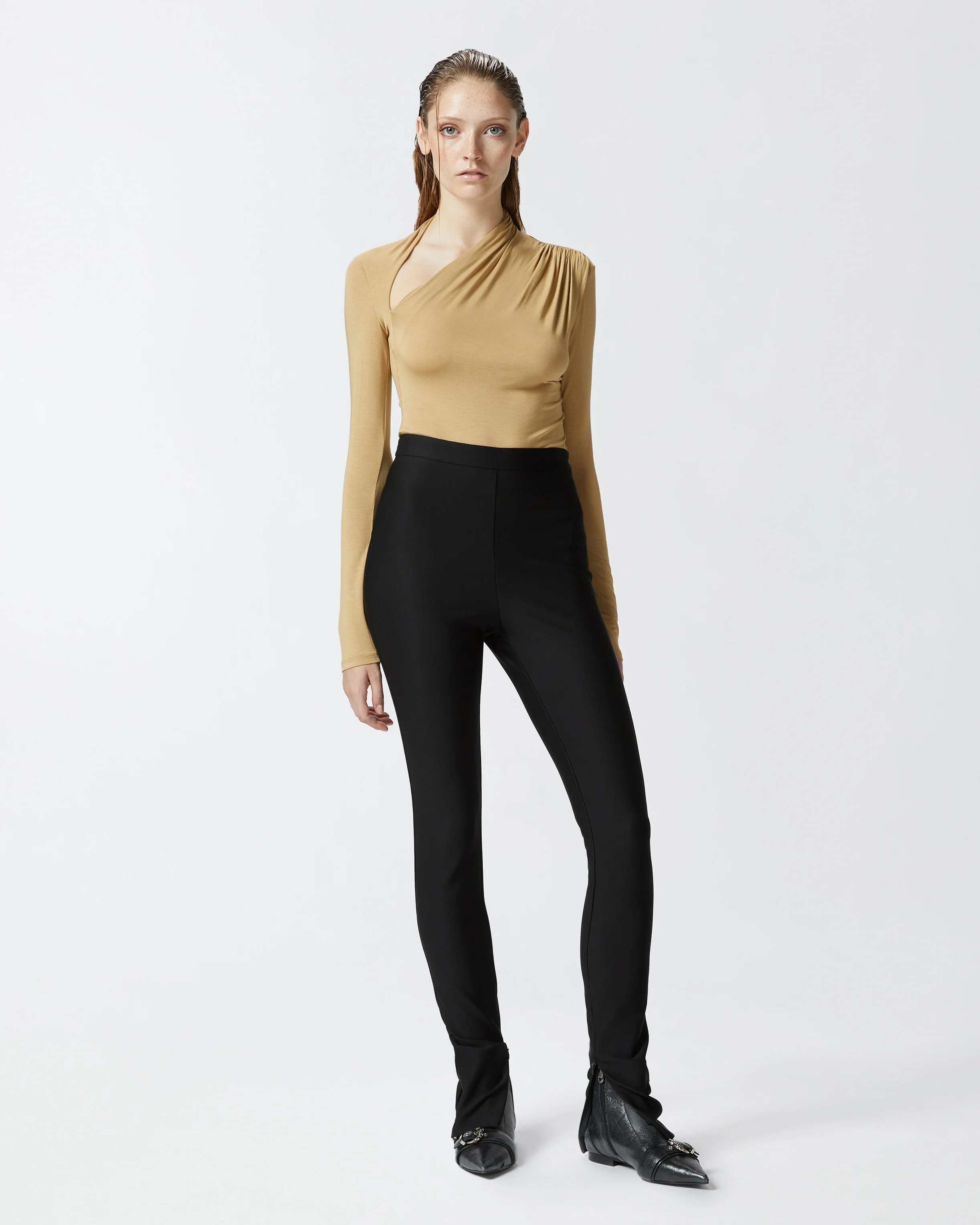 Pantalon stretch moulant avec bas de jambe zippé | Noir
