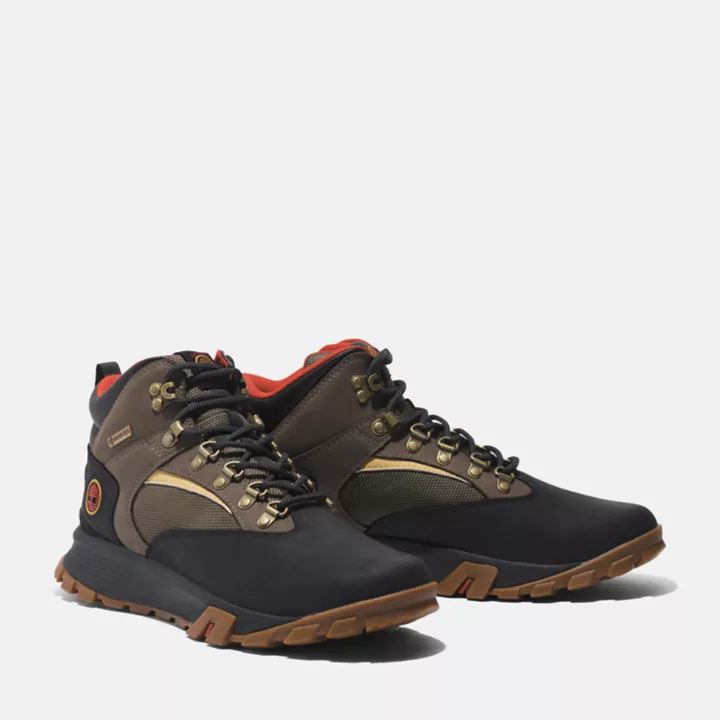 Bota de caminhada Mount Lincoln Mid impermeável para homens, nas cores preta e marrom.