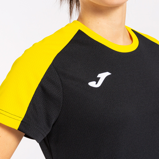 Camiseta Joma Eco Championship de manga curta, preta e amarela.