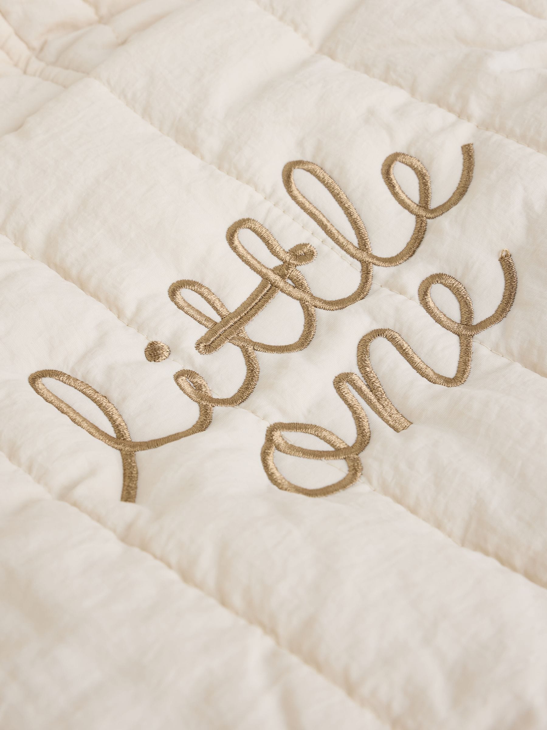 Ecru Little One rug-slogan - Doorgestikt nylon babypak