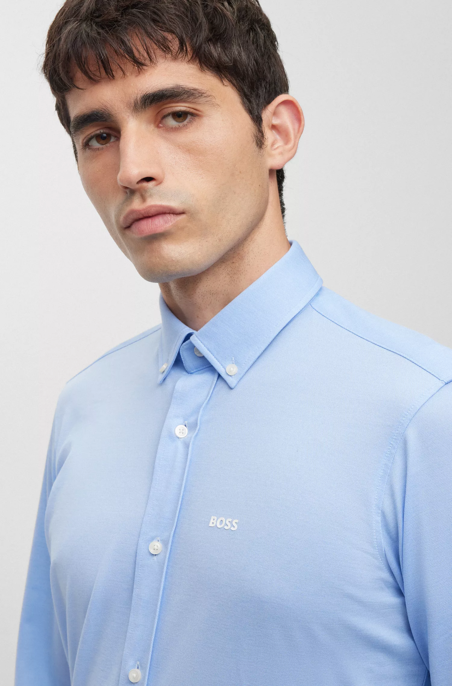 Camisa BOSS preta de corte regular em malha estruturada de algodão misto.