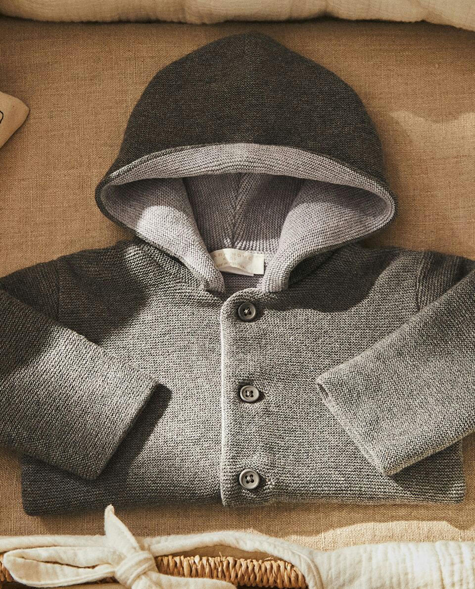 Jaqueta infantil com capuz em lã merino