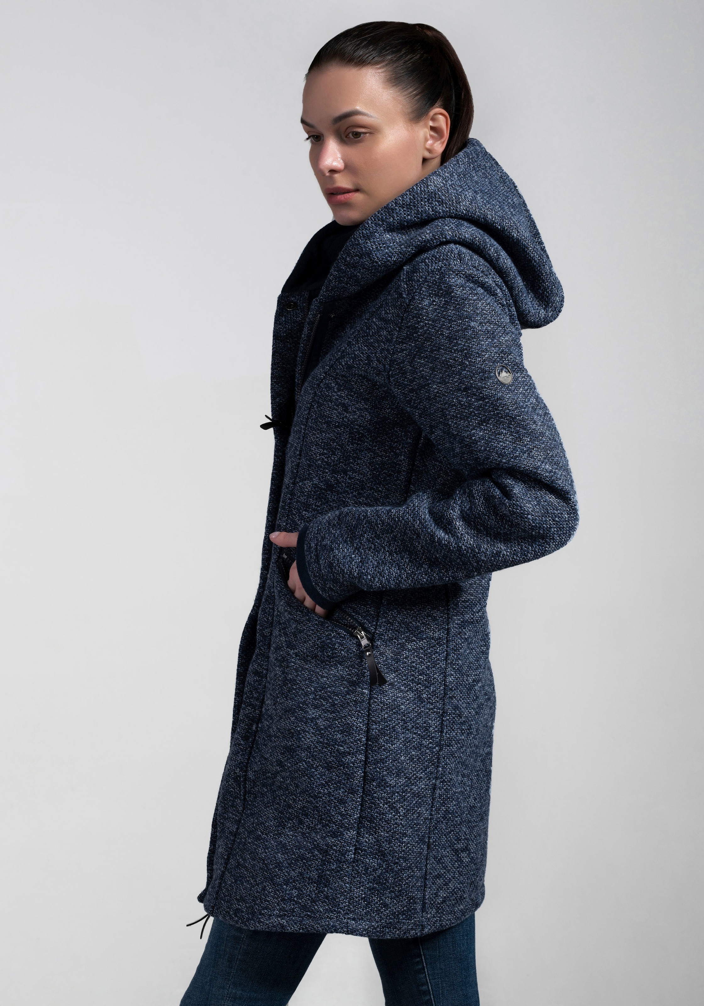 Polarino Strickmantel , atmungsaktiv und wärmeisolierend. Strickoptik aussen, Fleece innen.