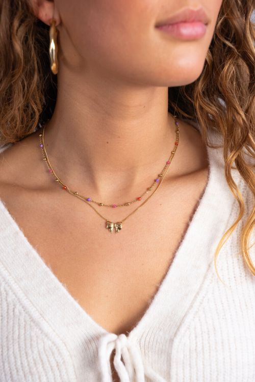 Ketting met roze en paarse kralen
